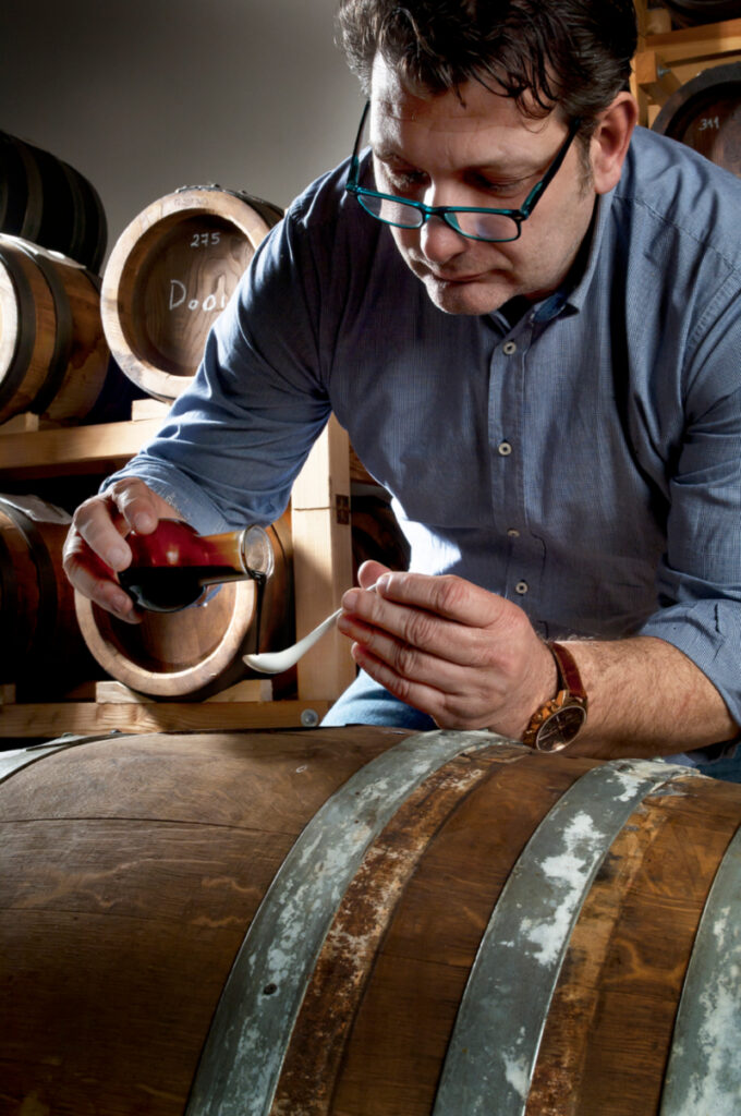 Andrea Iotti pouring vinegar into a spoon
